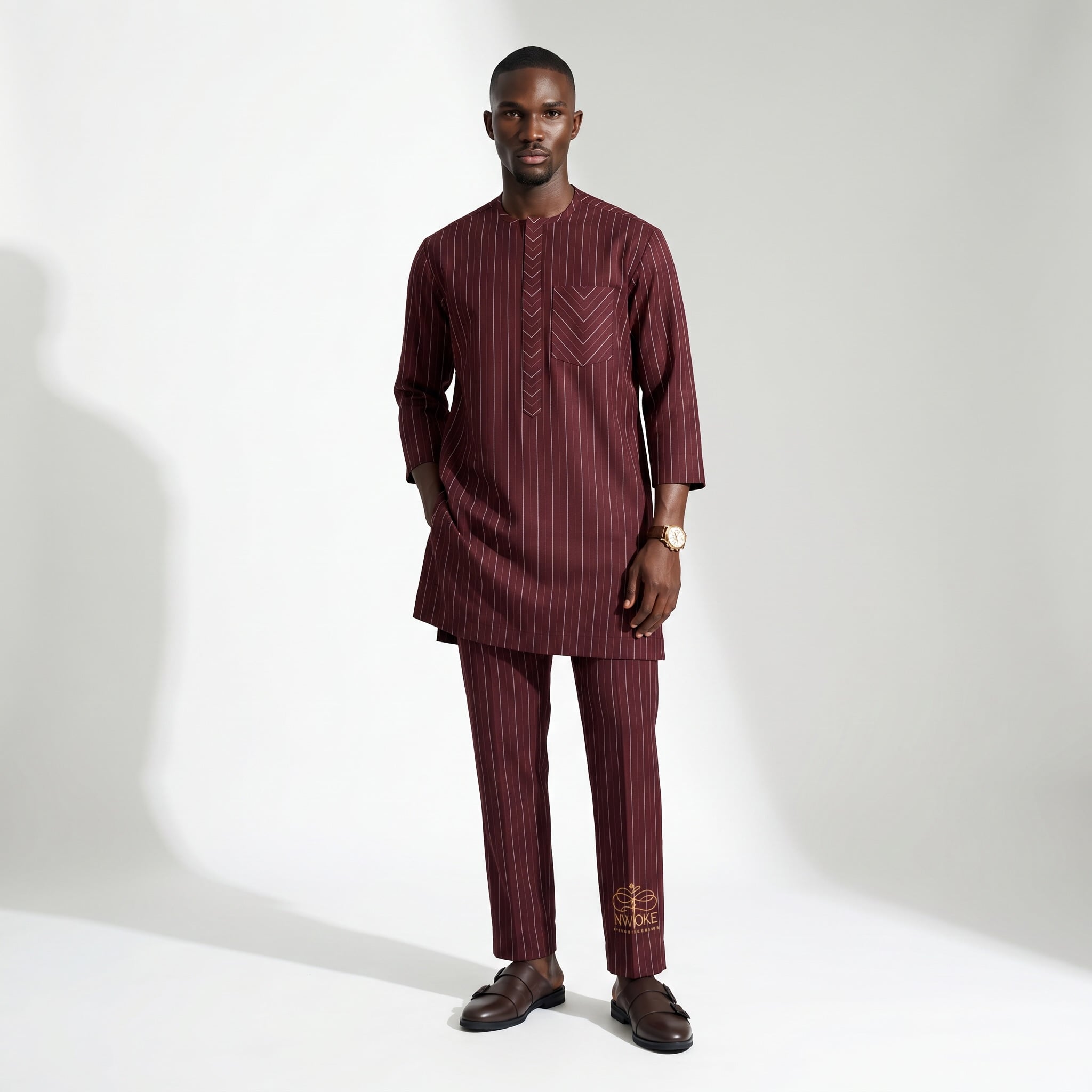The NWOKÉ Oxblood Pinstripe, a oxblood senator, worn by a model